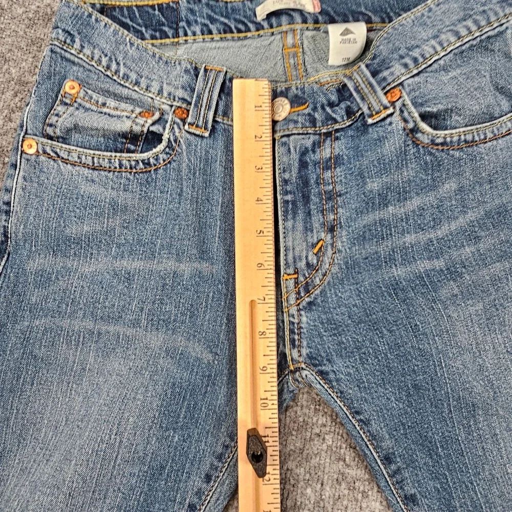 Vintage Levi's 542 Low Rise Flare Jeans Womens 12M Medium Wash Y2K Flap Pocket